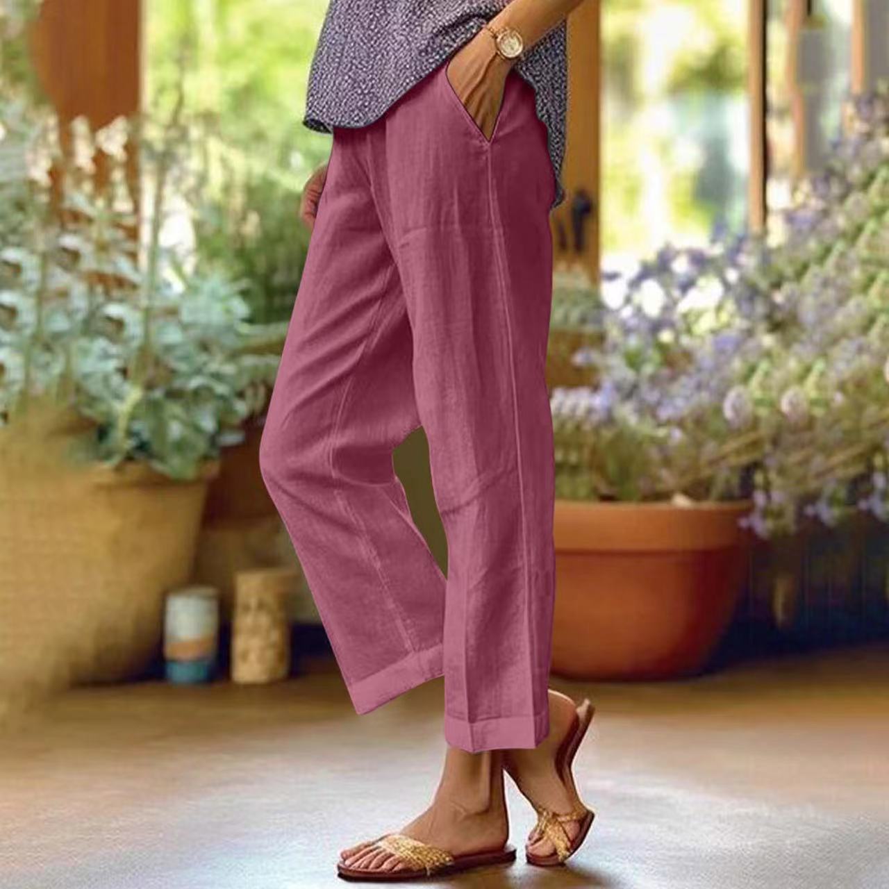 Relaxed ankle-length trousers in neutral tone, polished casual fit with clean modern silhouette