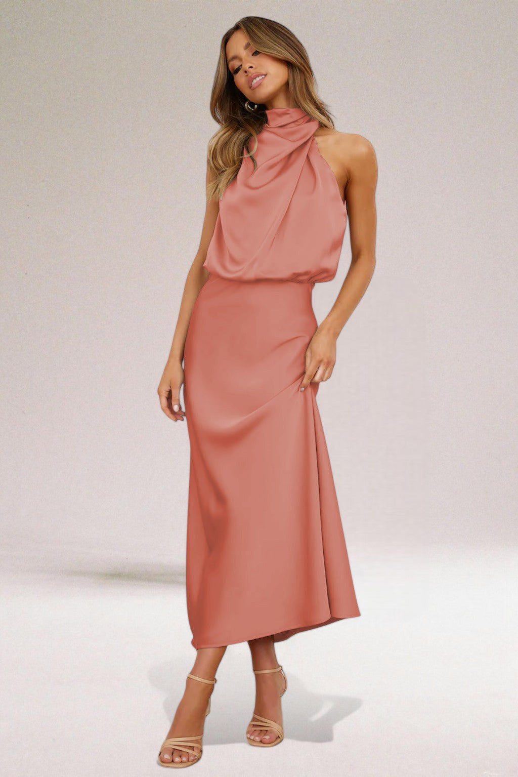 Women's black satin halter dress with elegant sleeveless silhouette and luxurious glossy finish