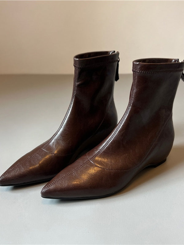 Women's black pointed toe stretch leather ankle boots with hidden wedge heel and back zipper