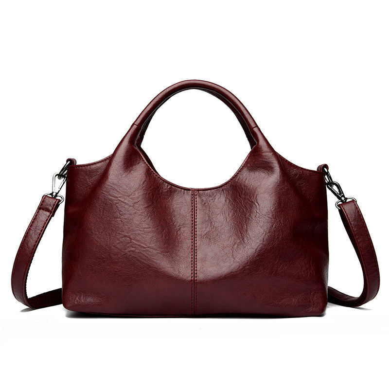 Retro medium PU leather tote bag for women, light luxury style with zippered pockets