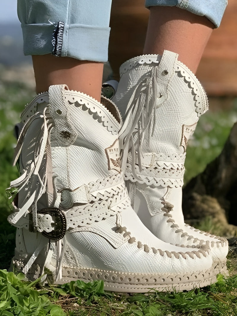 Women's fringe moccasin boots with handcrafted stitching, flowing fringes, lightweight festival style