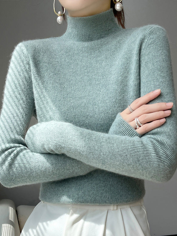 Women's elegant ribbed knit turtleneck sweater with flattering fit and structured silhouette