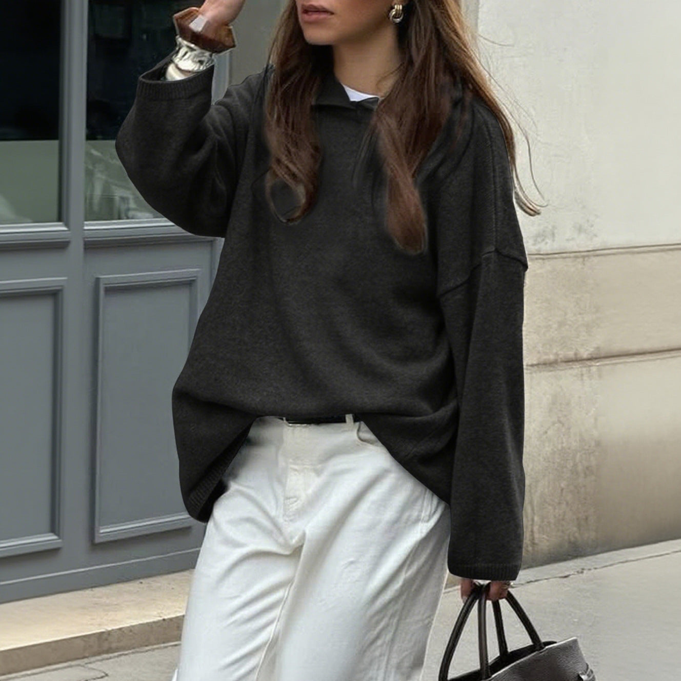 Women's oversized crew neck knit sweater in neutral tone, relaxed drapey silhouette soft fabric