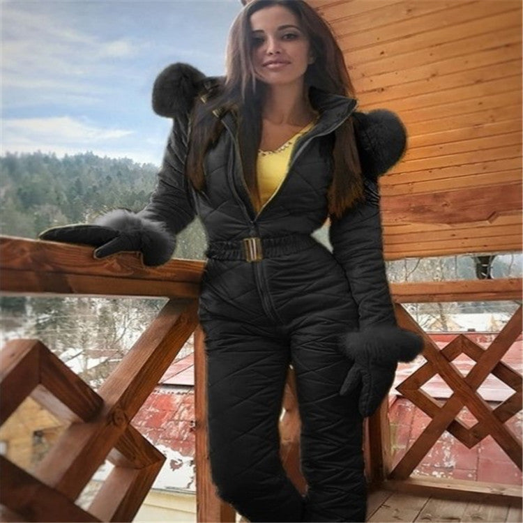Women's fitted insulated ski jumpsuit in elegant snow suit style with tailored silhouette