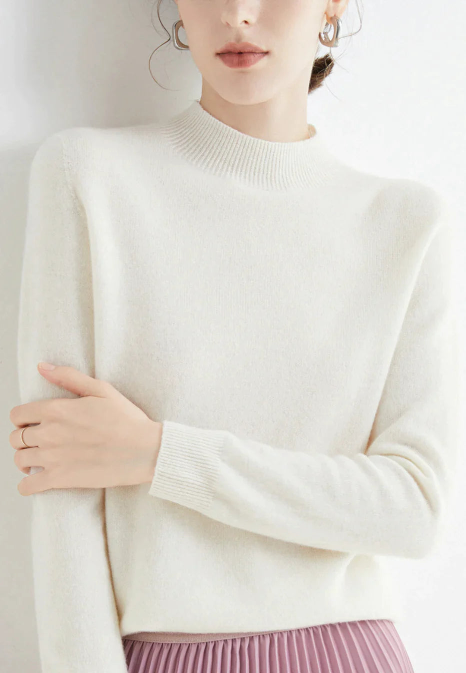 Women's elegant knit sweater in timeless style, soft luxurious fabric with classic flattering silhouette