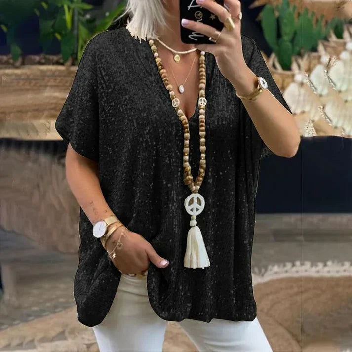 Women's silver sequin V-neck blouse with sparkling embellishment for elegant evening wear
