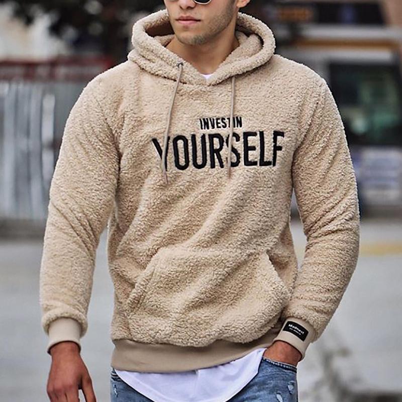 Unisex sherpa hoodie in cozy neutral tones with relaxed fit and plush fleece lining for warmth