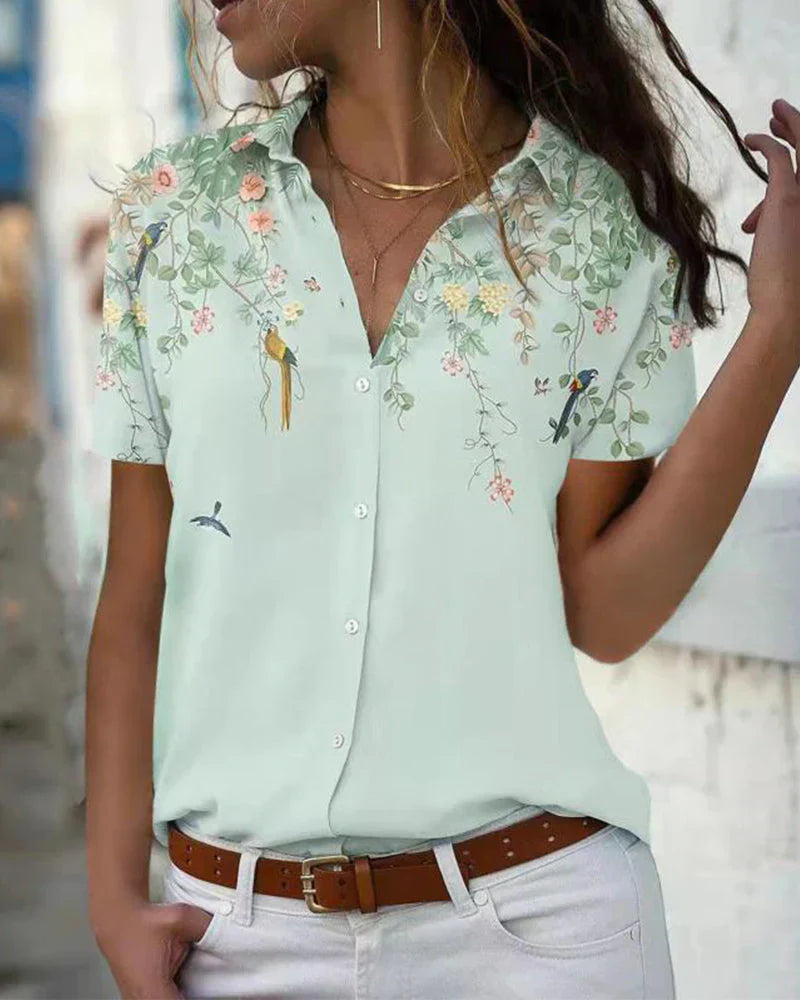 Women's floral print blouse with classic collar, elegant feminine design for casual to semi-formal wear