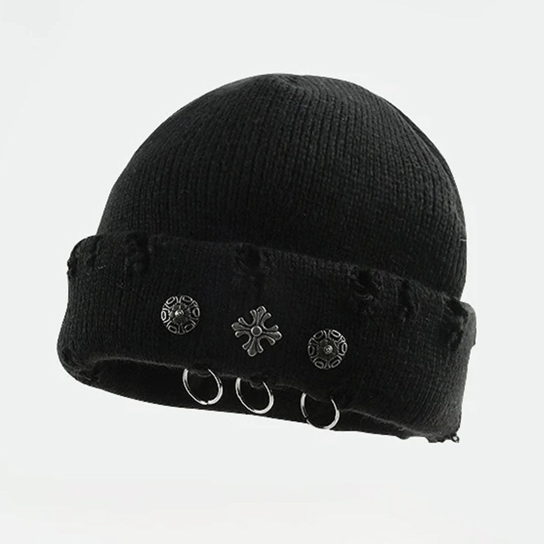 Distressed knit beanie with cross piercing hardware in streetwear style for cold weather