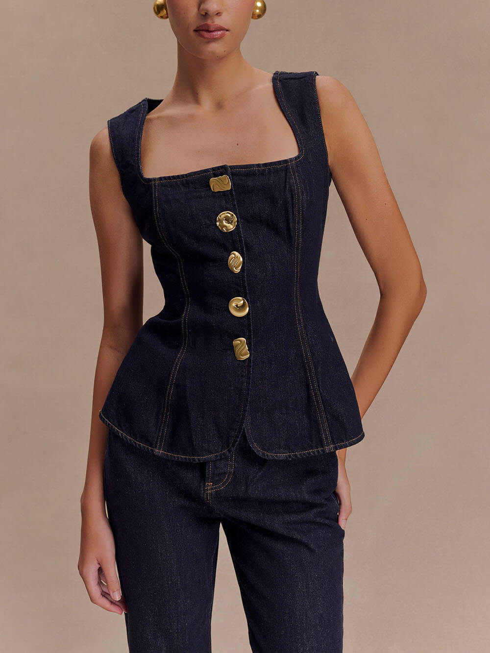 Women's blue denim sleeveless button-down vest top and high-waist straight jeans set irregular buttons