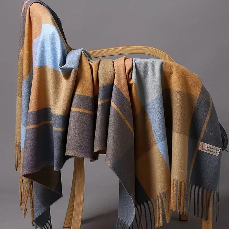 Women's oversized plaid wool shawl in classic pattern, cozy winter wrap with generous coverage