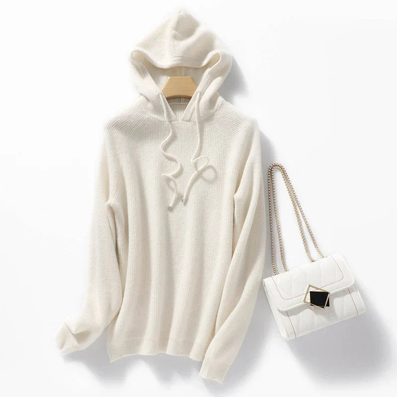 Women's slim fit merino wool hoodie in neutral tone, lightweight with silk-soft texture