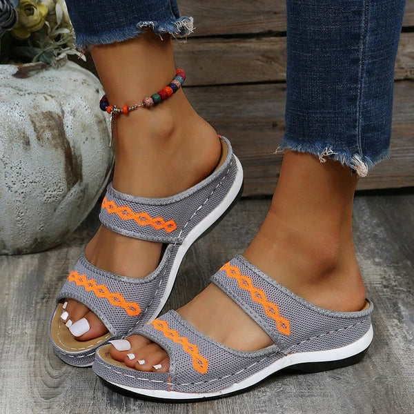 Beige leather orthopedic walking sandals with arch support, adjustable straps, and cushioned gel sole