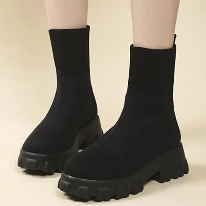Women's knitted ankle boots in neutral tones, slip-on style with flexible knit upper and fashion-forward sole