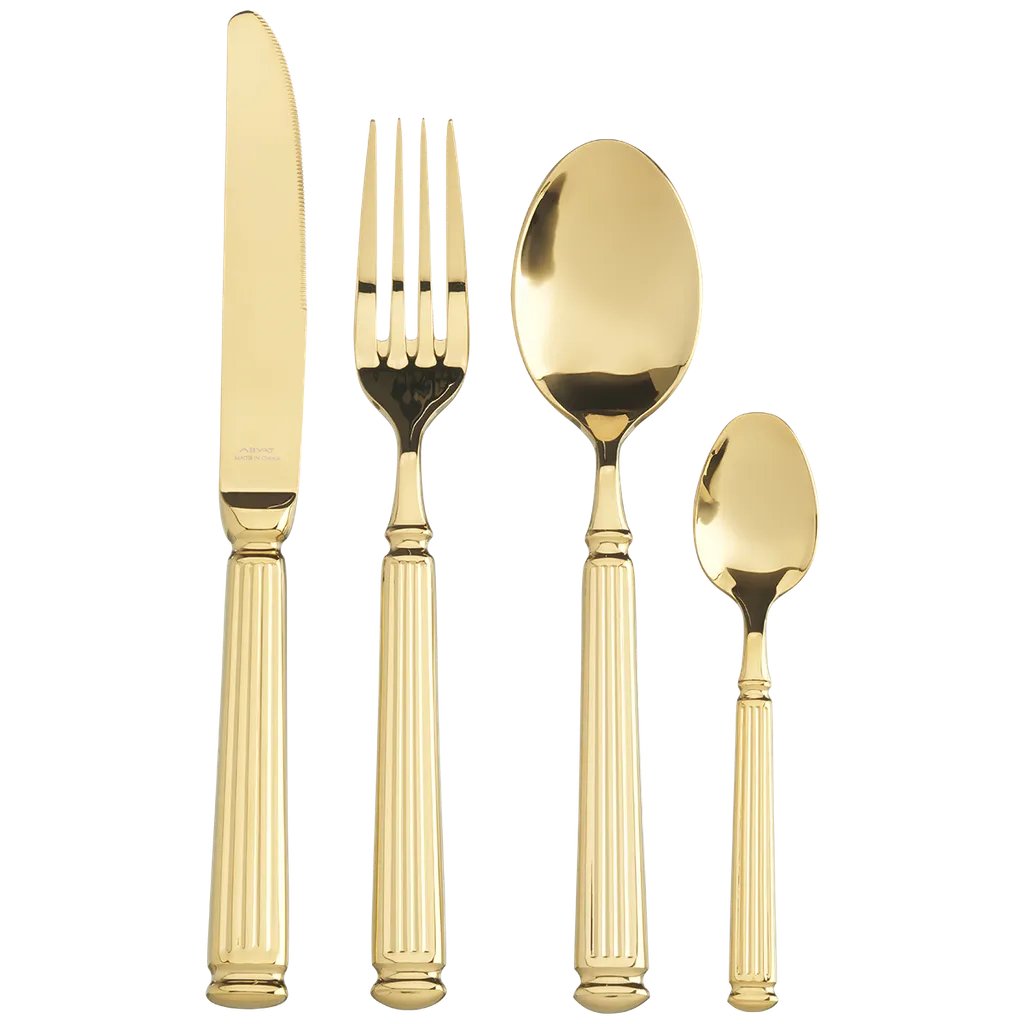Gold sculpted flatware set with glossy finish, architecture-inspired handles for elegant dining