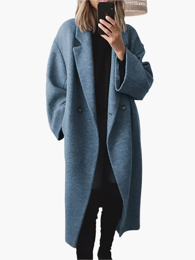 Women's loose fit longline winter coat minimal oversized silhouette cozy elegant outerwear