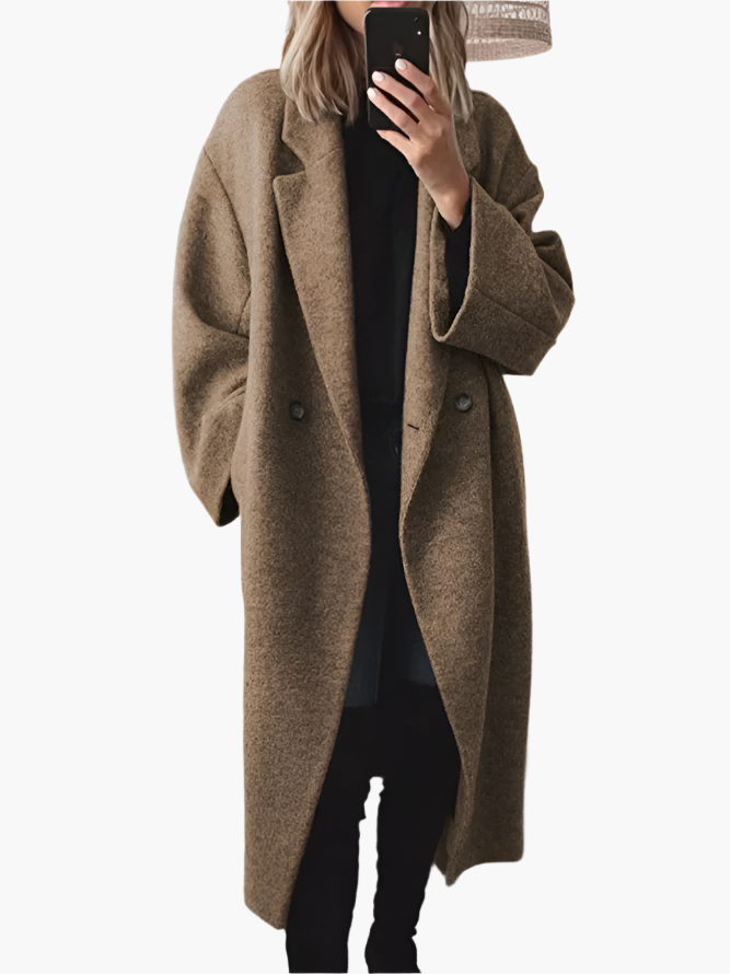 Women's loose fit longline winter coat minimal oversized silhouette cozy elegant outerwear