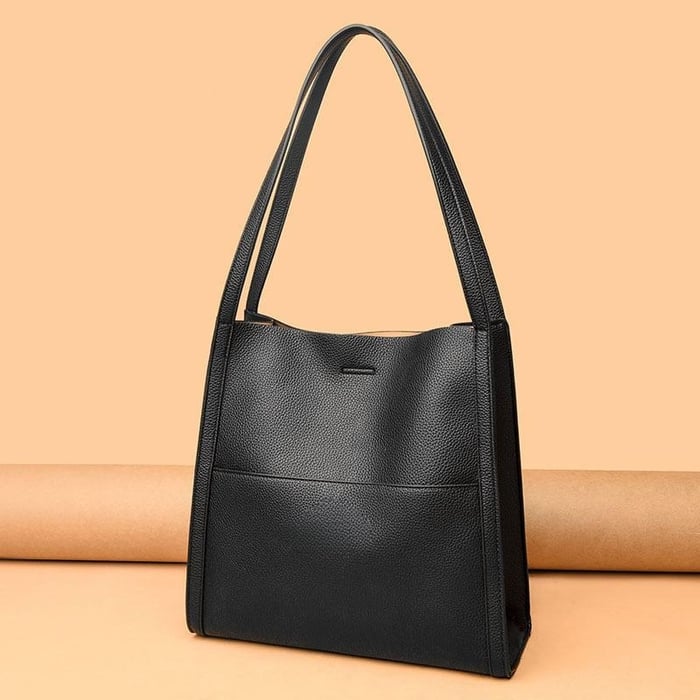 Ruby handmade vegan leather shoulder bag minimalist silhouette eco-chic sustainable everyday style