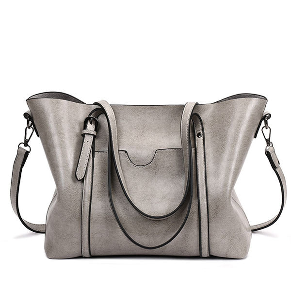 Vera brown leather handbag handcrafted artisan details structured silhouette everyday modern women