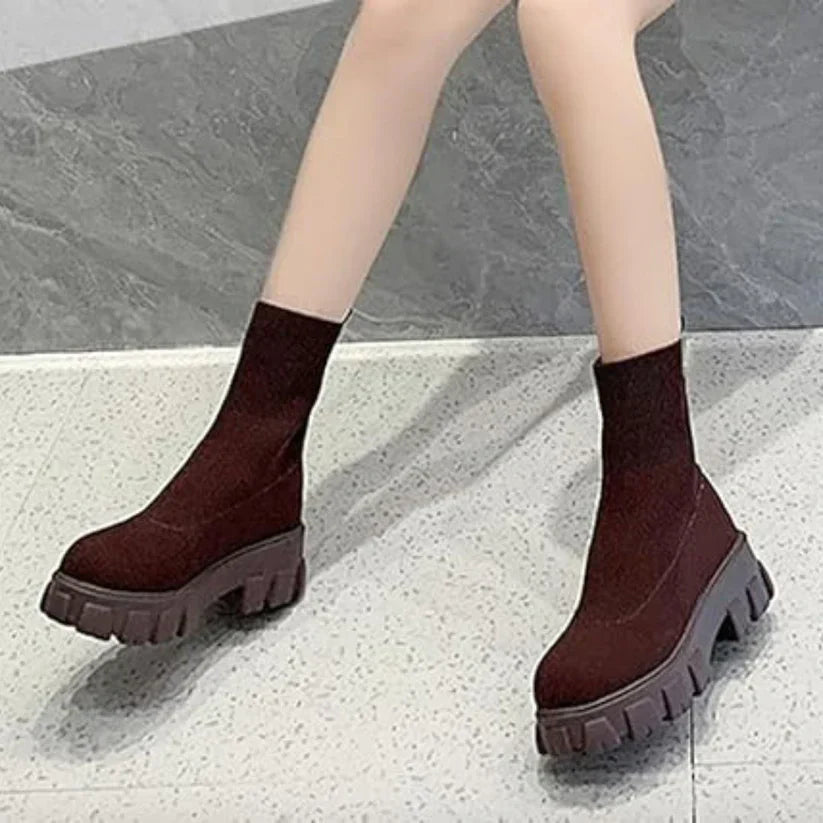 Women's knitted ankle boots neutral tone slip-on style with flexible knit upper and fashion-forward sole
