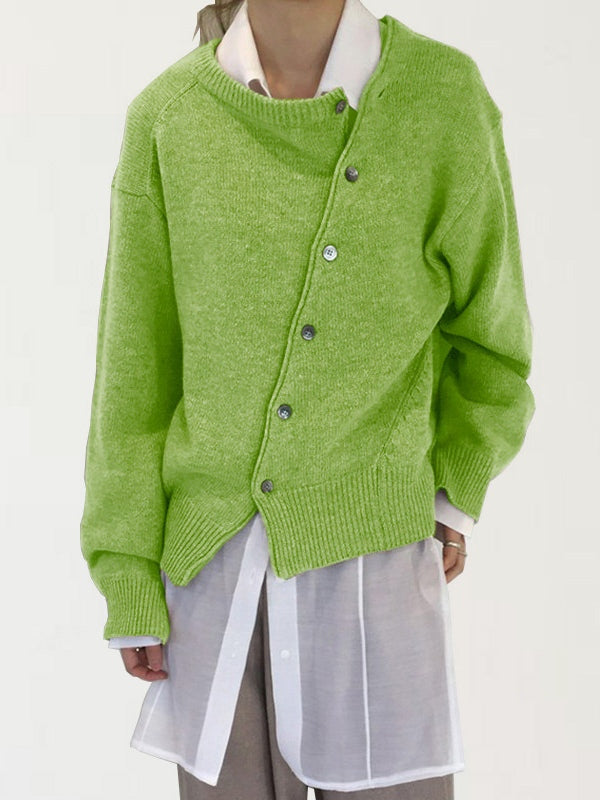 Women's distressed patchwork cardigan in thick acrylic knit, loose fit with slanted buttons and irregular hem