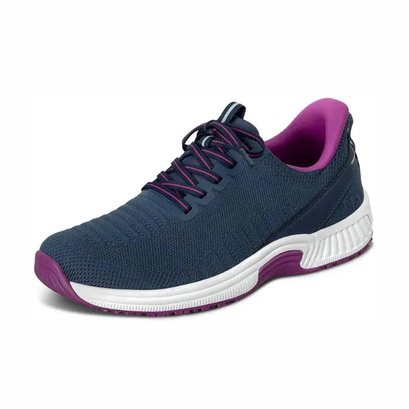 Women's orthopedic slip-on sneakers in neutral knit fabric with hands-free entry and cushioned sole