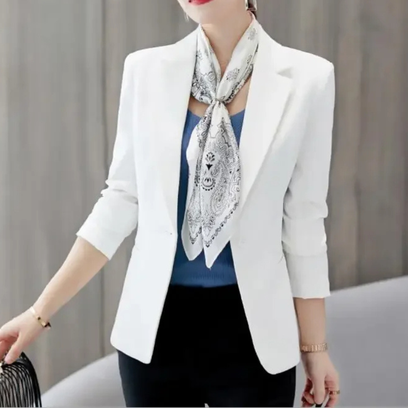 Women's slim fit tailored office blazer in classic cut with one-button closure for a sleek silhouette