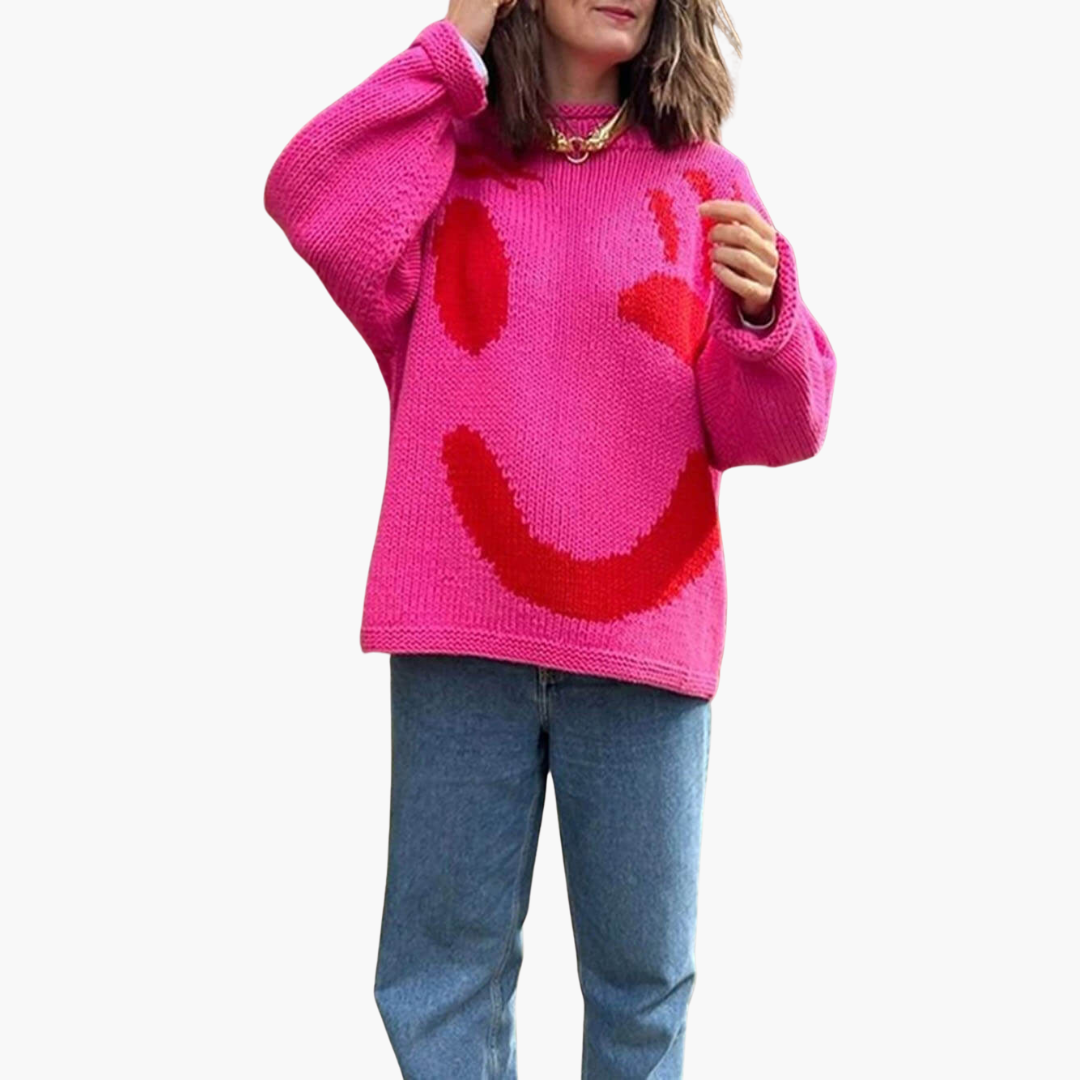 Women's oversized cream knitted sweater with playful smiley motif, cozy relaxed fit casual knitwear