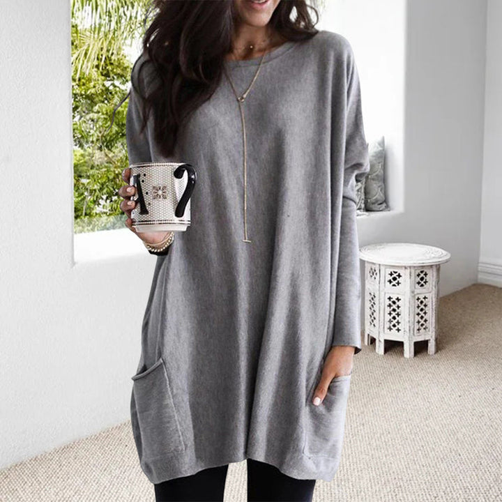 Women's long winter tunic with pockets, cozy casual lounge wear featuring round neckline relaxed fit