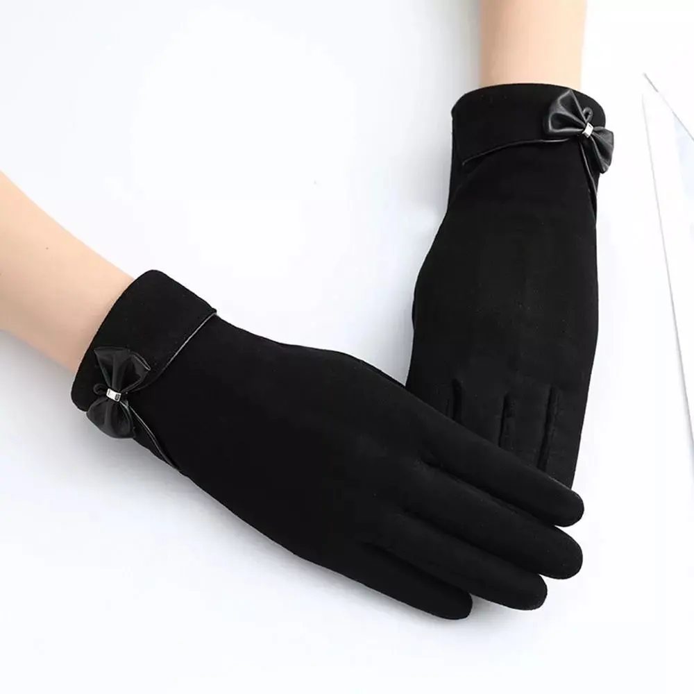 Women's black winter gloves with elegant bow detail and touchscreen-compatible split finger design