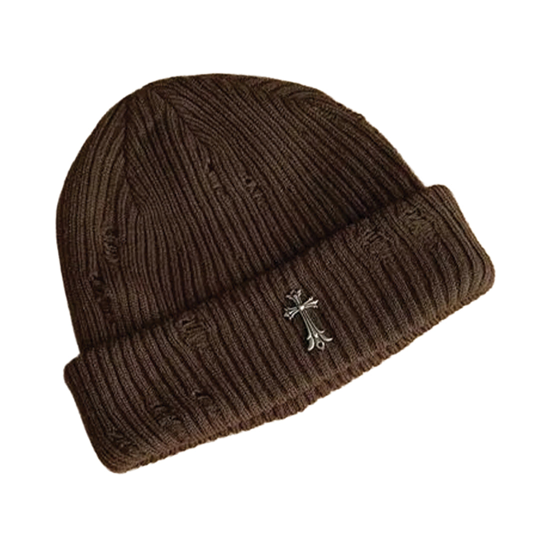 Black ribbed knit beanie with distressed finish and bold metal iron cross emblem for streetwear