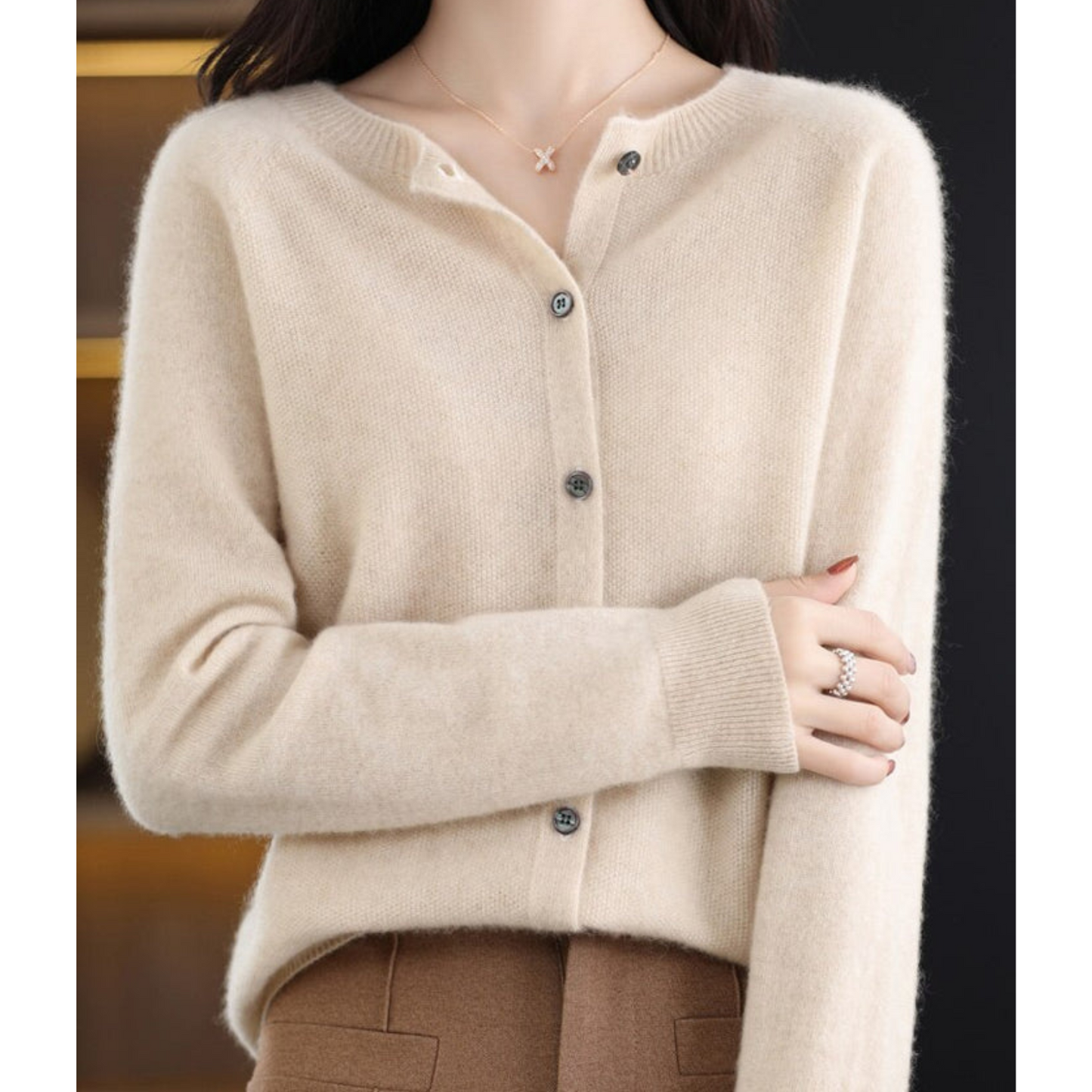 Women's merino wool cardigan round neck knit in neutral tone, soft luxurious slim-fit silhouette