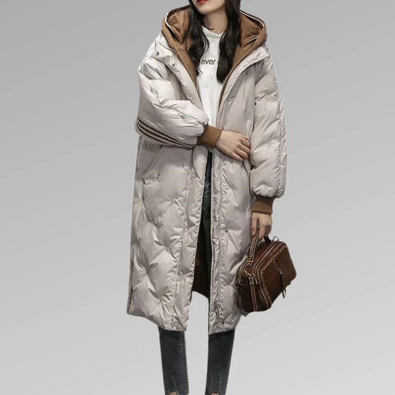 Women's premium insulated winter coat with elegant chic silhouette, cozy lined warmth for cold days