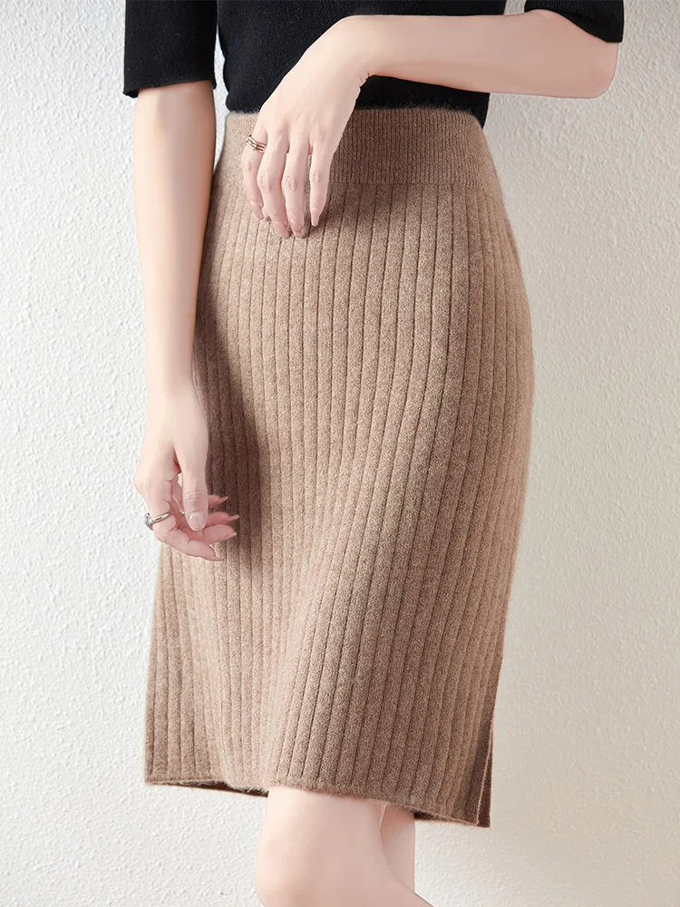 Women's ivory merino wool ribbed high-waist skirt with vertical texture and streamlined silhouette