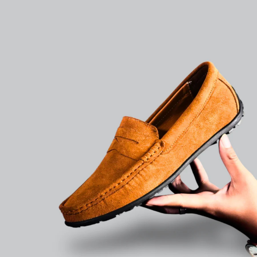 Men's black slip-on loafer classic silhouette with effortless no-lace design for professionals