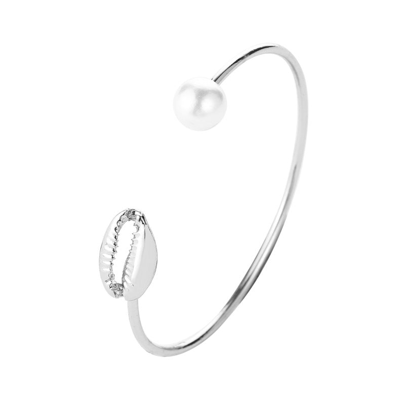 Women's delicate pearl shell bangle bracelet coastal maritime design elegant summer accessory