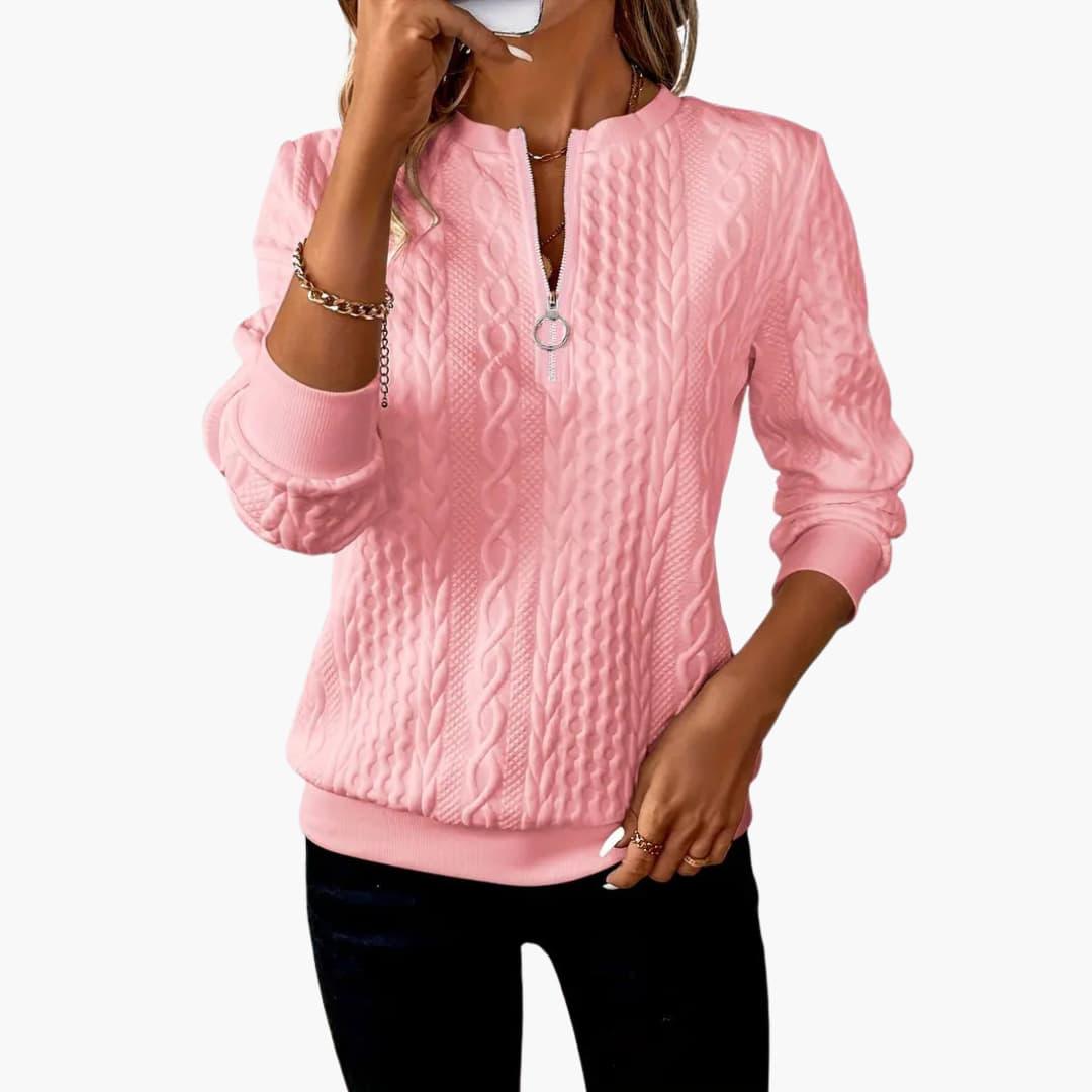 Women's cable knit pullover sweater with front zip neckline, long sleeves, and ribbed cuffs classic cozy fit