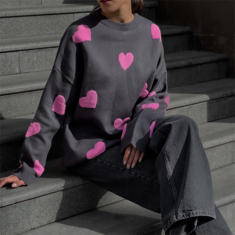 Women's oversized knit sweatshirt with heart pattern, cozy relaxed fit for effortless casual style