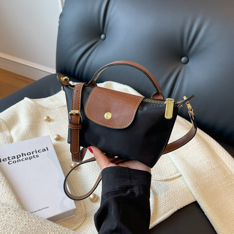Delilah structured Oxford fabric handbag timeless silhouette versatile everyday elegance multiple colors