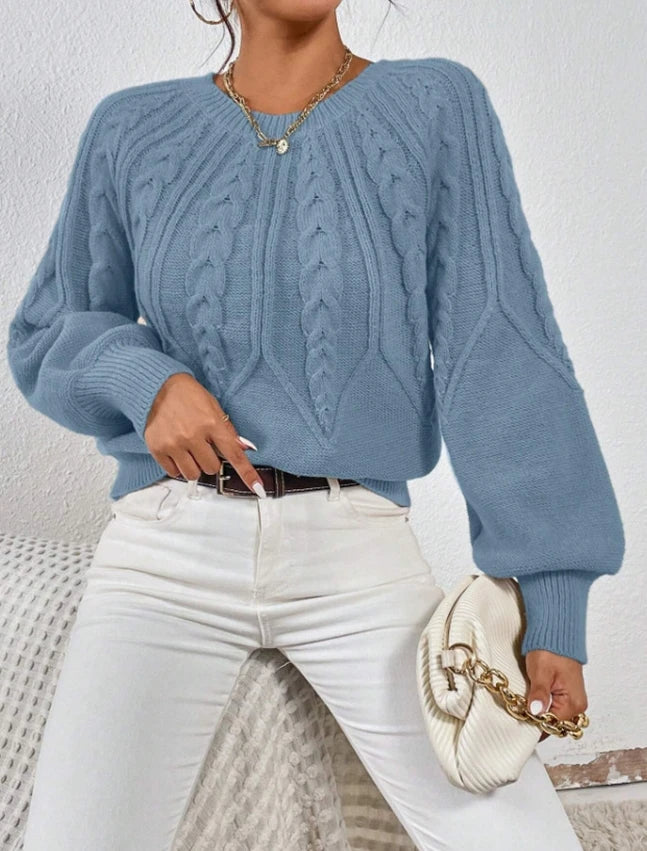 Women's cream cable knit cropped sweater with balloon sleeves and elongating silhouette mid-weight knit