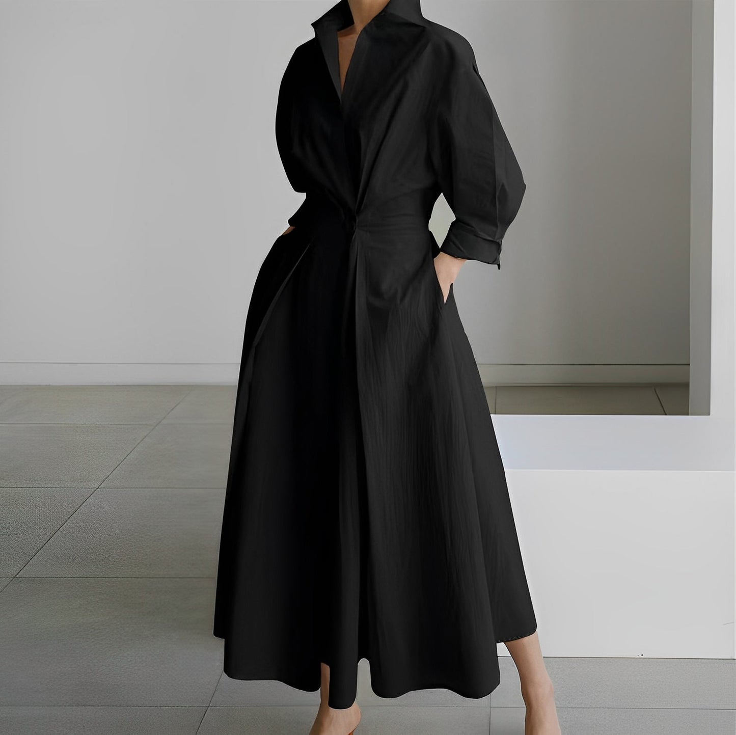 Women's maxi shirt dress minimalist style belted waist flared hem clean lines elegant silhouette