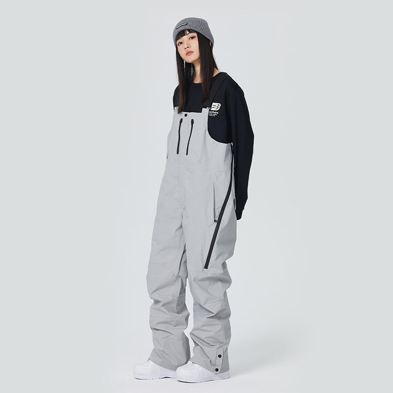 Women's black waterproof snow overall pants with adjustable suspenders and fully taped seams