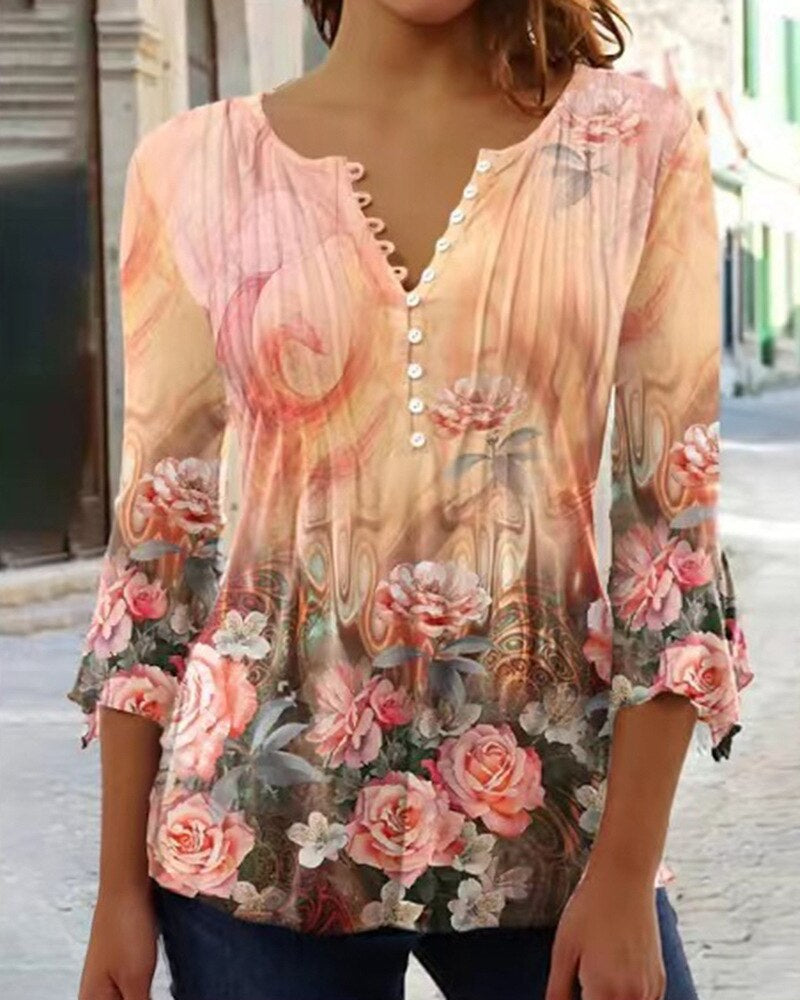 Women's light pleated blouse with scalloped V-neckline and front button detail for day-to-evening wear
