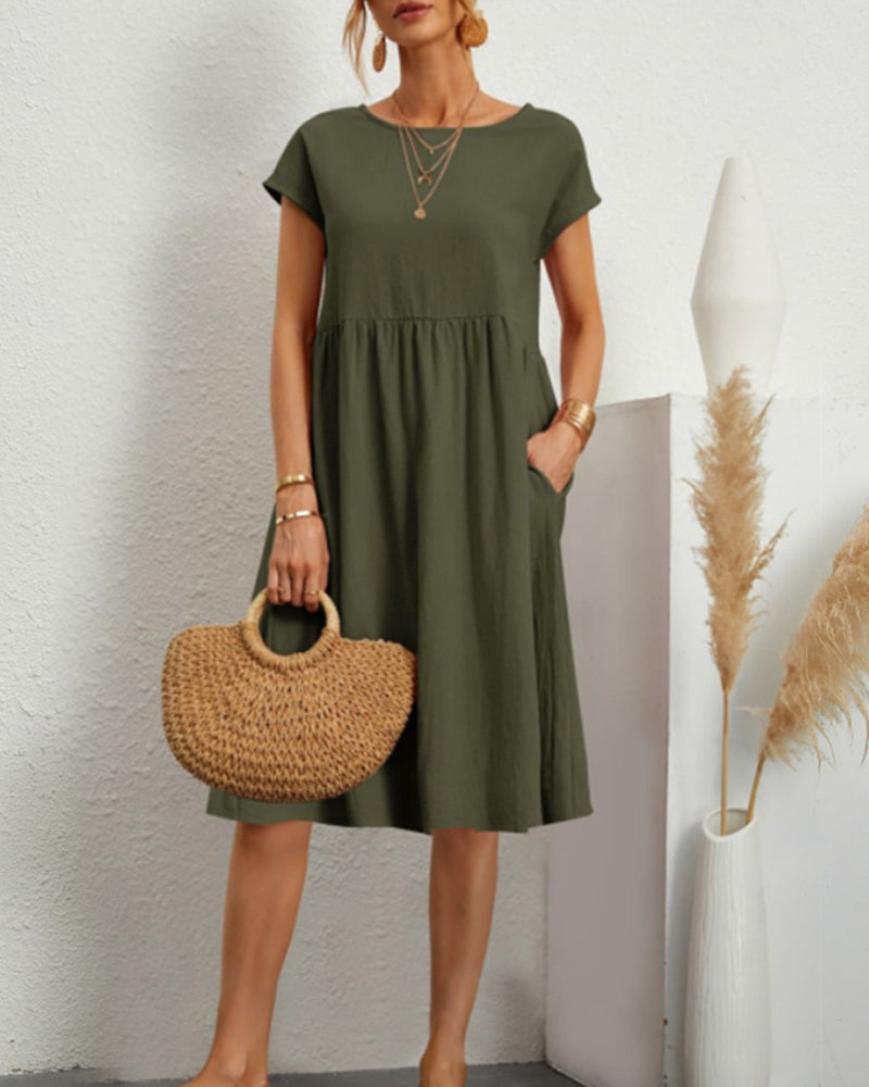 Women's round neck midi dress with pockets, versatile everyday style in polished silhouette