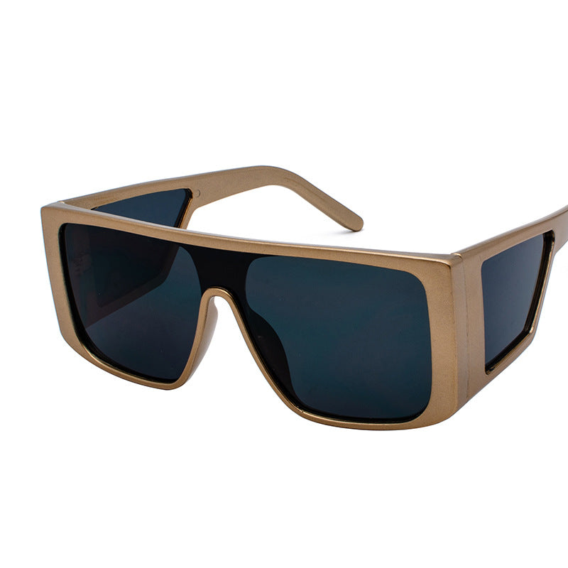 Oversized angular retro sunglasses with colored UV400 lenses, bold futuristic festival street-style eyewear