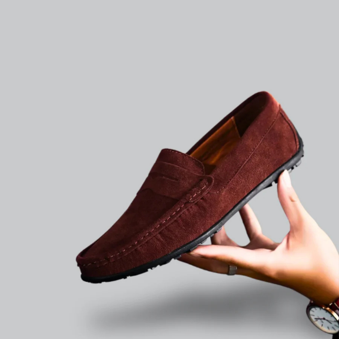 Men's black slip-on loafer classic silhouette with effortless no-lace design for professionals