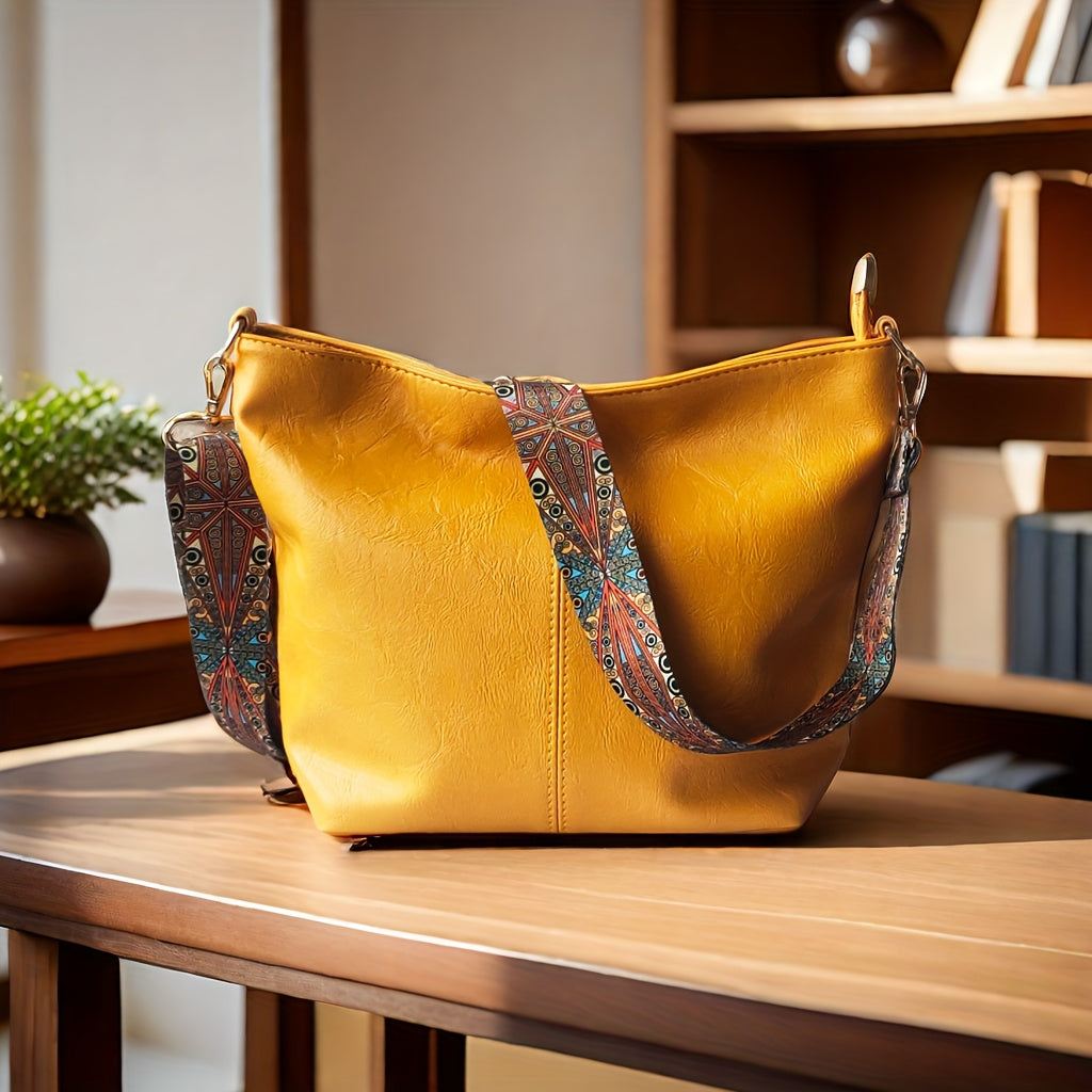 Women's everyday shoulder bag with wide adjustable strap, large interior pocket, versatile casual style