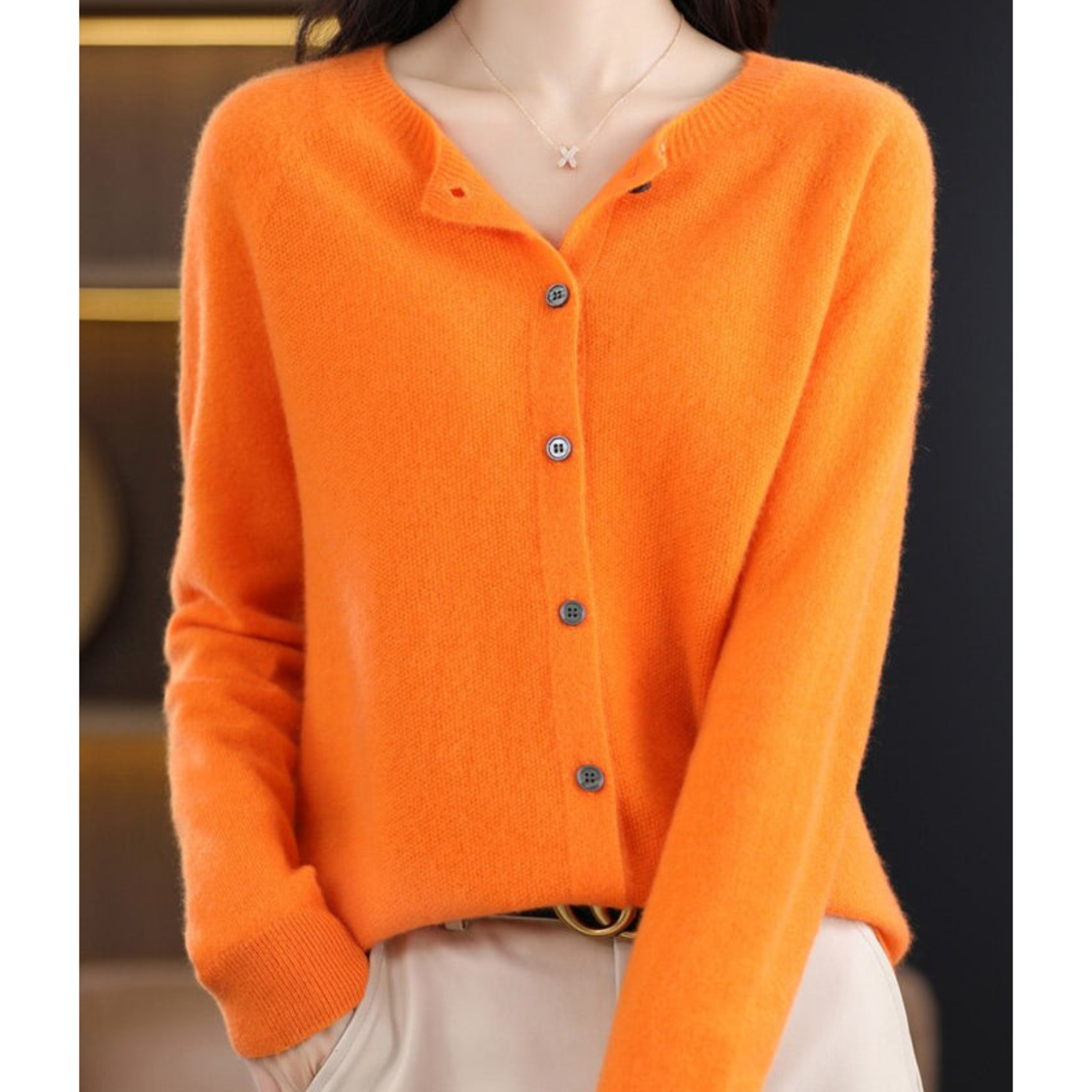 Women's merino wool cardigan in classic knit with round neck, luxurious warmth and sleek silhouette