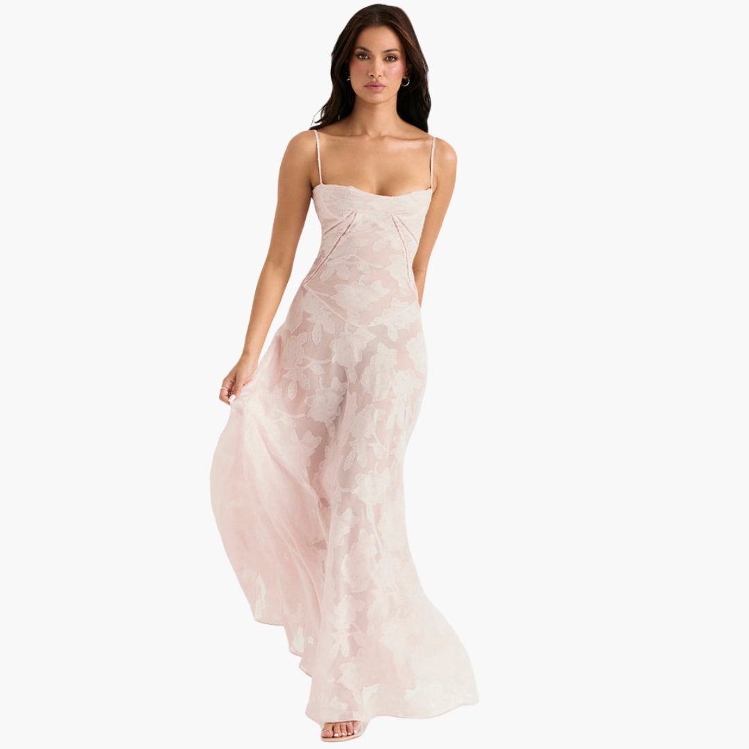 Women's ivory vintage long lace gown with delicate beaded details and flowing feminine silhouette