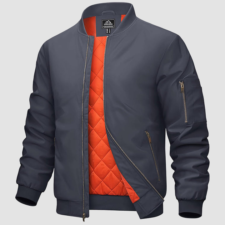 Men's black bomber jacket zip-up windbreaker with quilted orange interior lining and multi-pockets